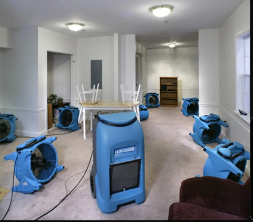 Air movers and dehumidifier setup for Water Damage Restoration in Geneseo